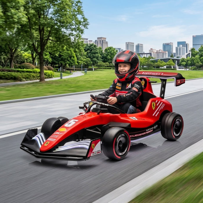 Child riding the SonicTeck Formula F1 brushless go-kart with LED lights at speed on a paved road beside a green park and modern cityscape