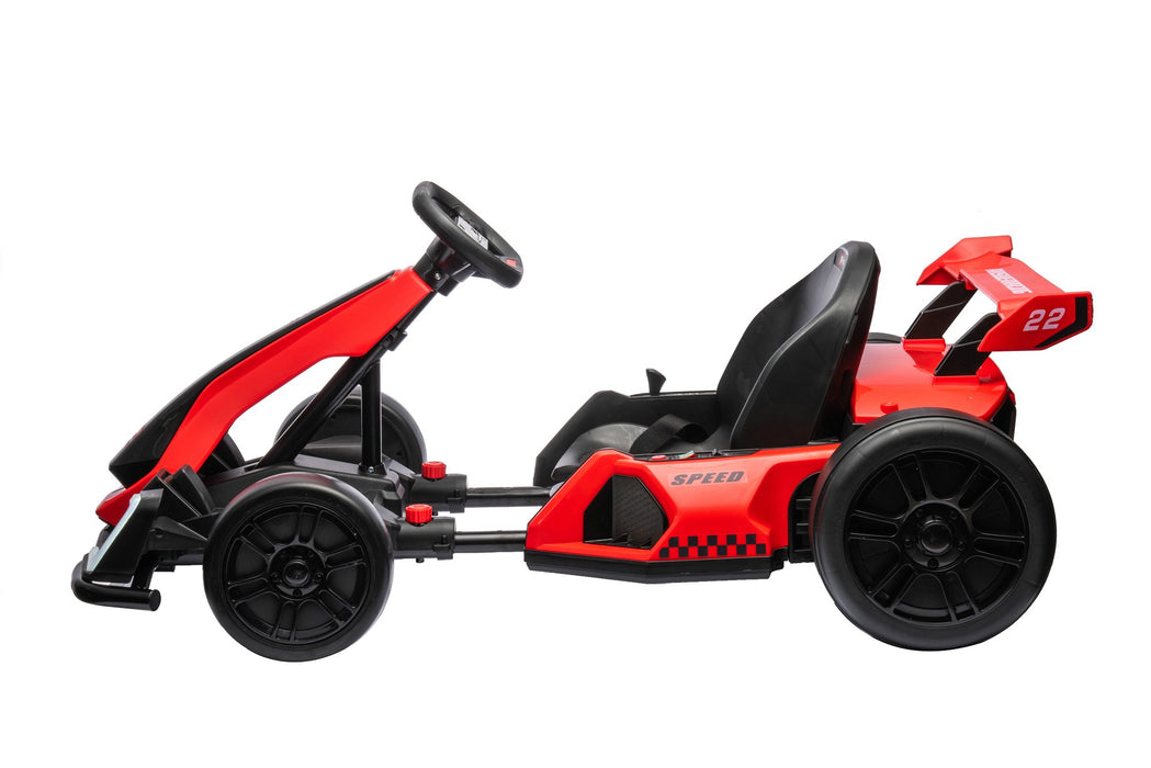 Red and black toy 24volts go-kart on a white background