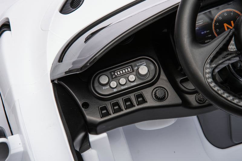 McLaren 765LT 12V Kids Ride-On Car in white with rubber tires, leather seat, LED lights, butterfly doors, parental remote control, and rechargeable battery.