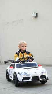 Toyota GR Supra GT4 licensed 12V ride on car front view at SonicTeck with a child inside