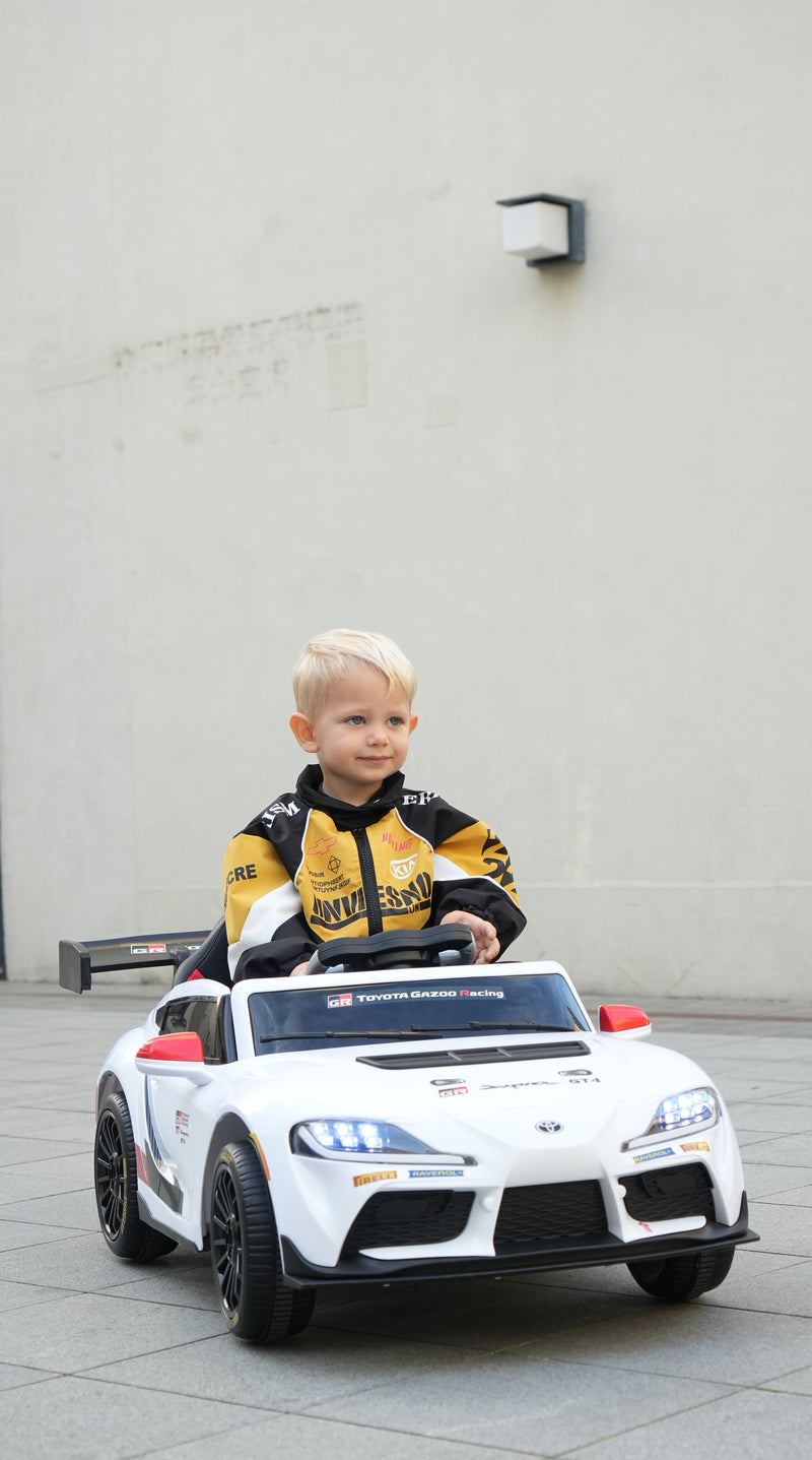 Toyota GR Supra GT4 licensed 12V ride on car front view at SonicTeck with a child inside