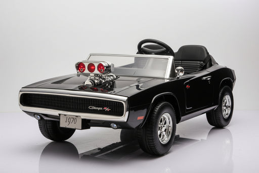 A black 1970 Dodge Charger toy ride-on car with chrome details, a custom engine decoration, and a convertible design, shown on a white background with a reflection.