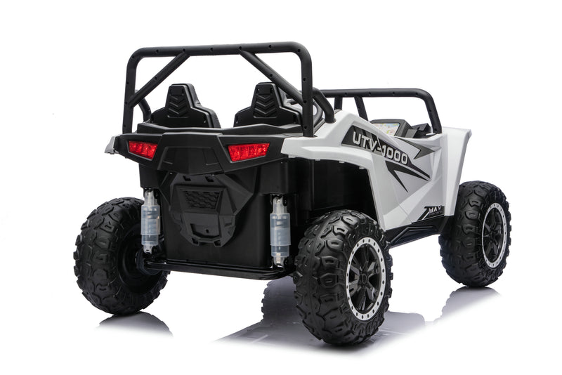 Apex XXL 24V ride-on UTV driving on grass.