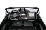Dashboard controls and driving features inside the Apex XXL UTV.