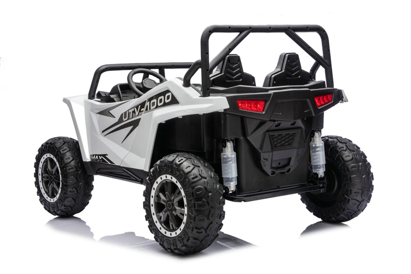 Apex XXL ride-on UTV driving on pavement.