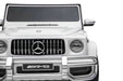 Mercedes G63 AMG 24V ride-on car for kids in black, officially licensed with rubber tires and LED lights.