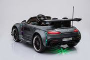 Rear View of Grey Mercedes-Benz AMG GT ride-on car with an underglow and LED lights turned on