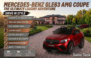 Red Mercedes-Benz GLE63 AMG Coupe 12V kids ride-on car with vertical Panamericana grille, LED headlights, and multi-spoke wheels parked on a cobblestone driveway outside a luxury home