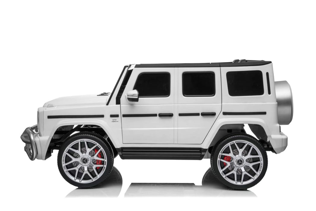 Kids driving the Mercedes G63 AMG electric ride-on car outdoors, 4x4 motors and realistic G-Wagon design.