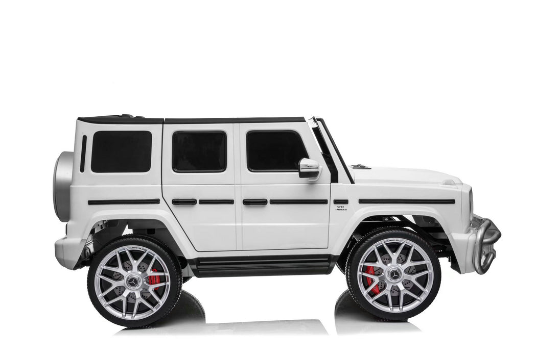 White Mercedes G63 kids ride-on SUV with LED headlights, designed for outdoor fun and adventure.
