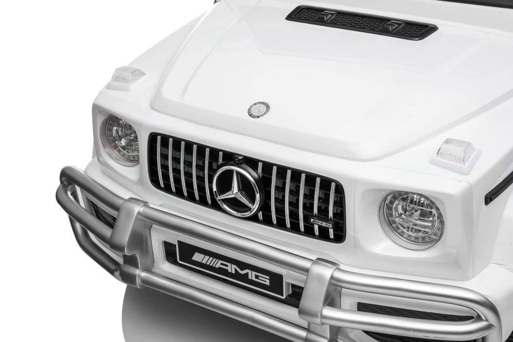 LED headlights and taillights on Mercedes G63 24V ride-on SUV for kids, perfect for realistic day or night play.