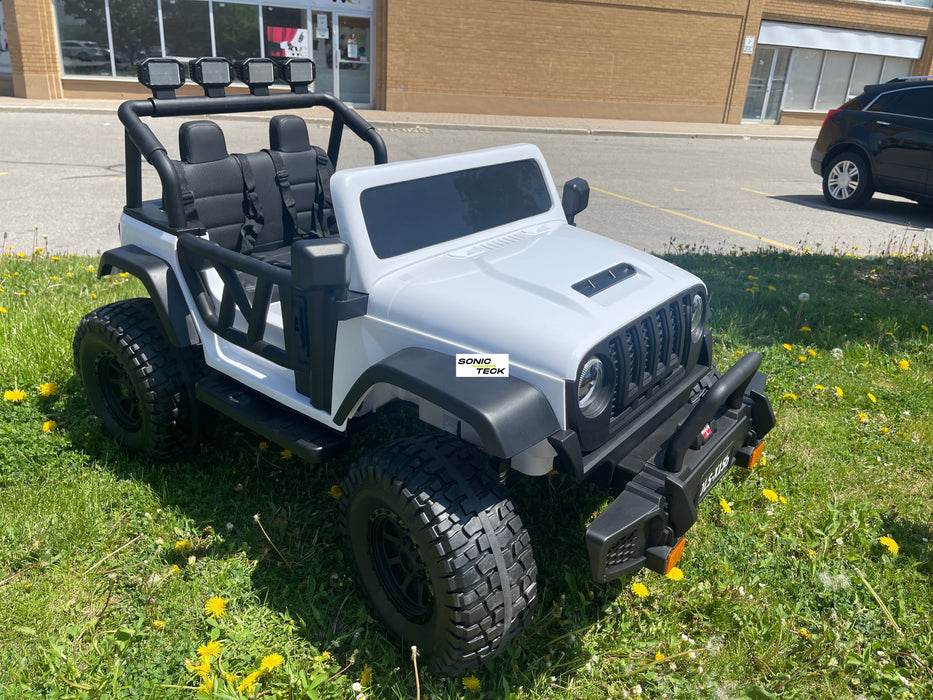 Monster Jeep 24V Ride-On Car – 2-Seater, 4X4 with 800W Motors, Lifted Suspension, Rubber Wheels, Bluetooth, LED Lights, and Parental Remote for Kids