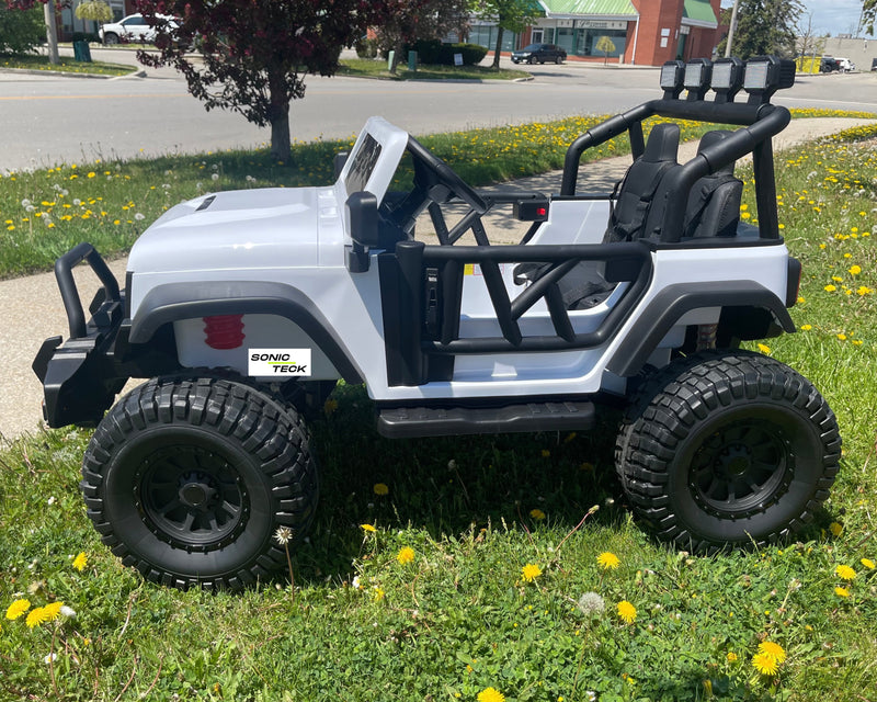 Monster Jeep 24V Ride-On Car – 2-Seater, 4X4 with 800W Motors, Lifted Suspension, Rubber Wheels, Bluetooth, LED Lights, and Parental Remote for Kids