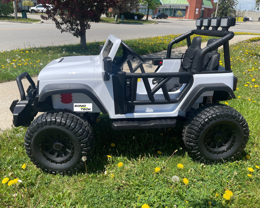 Monster Jeep 24V Ride-On Car – 2-Seater, 4X4 with 800W Motors, Lifted Suspension, Rubber Wheels, Bluetooth, LED Lights, and Parental Remote for Kids