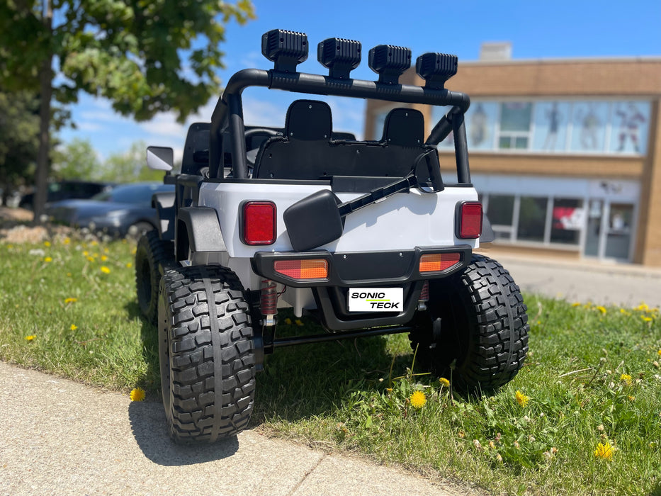 Monster Jeep 24V Ride-On Car – 2-Seater, 4X4 with 800W Motors, Lifted Suspension, Rubber Wheels, Bluetooth, LED Lights, and Parental Remote for Kids