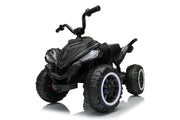 Black kids' ride-on ATV with large off-road tires, handlebars, and front headlights, shown on a clean white background with a subtle reflection.