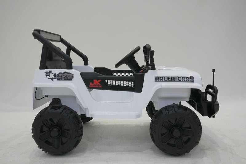 Close-up of wheels and tires on white ride-on Jeep Wrangler